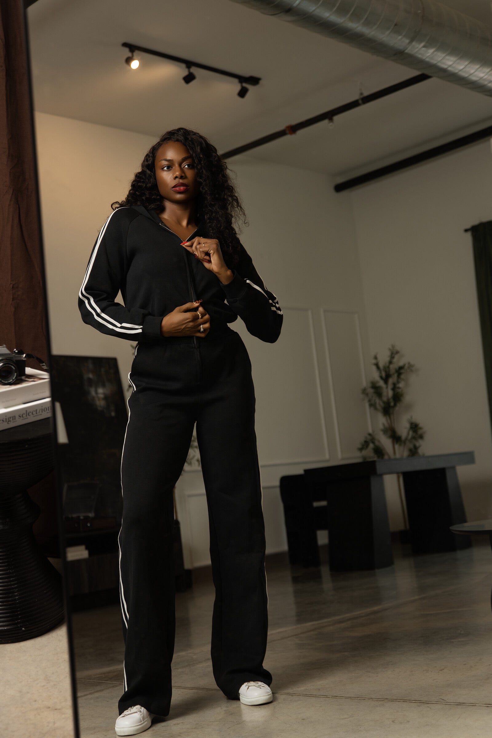 Tall black track jumpsuit lifestyle front view